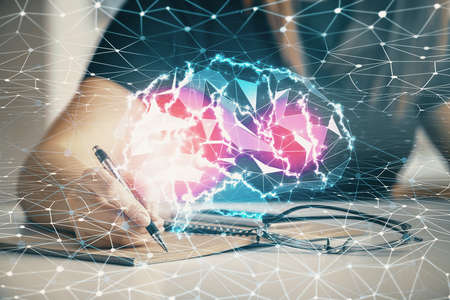 Multi exposure of woman's writing hand on background with brain hologram. Concept of brainstorming.