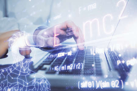 Science formula hologram with man working on computer on background. Education concept. Double...