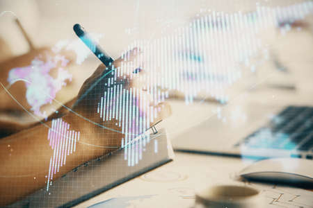 Double exposure of business theme drawing over people taking notes background. Concept of financial...