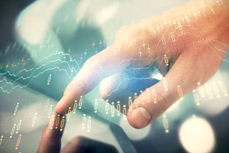Multi exposure of man hands holding and using a phone and financial chart drawing. Market analysis...
