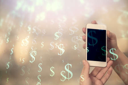 Double exposure of forex graph sketch hologram and woman holding and using a mobile device. Stock...