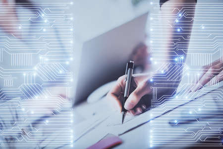 Technology theme hologram over womans hands taking notes background. Concept of Tech. Double...