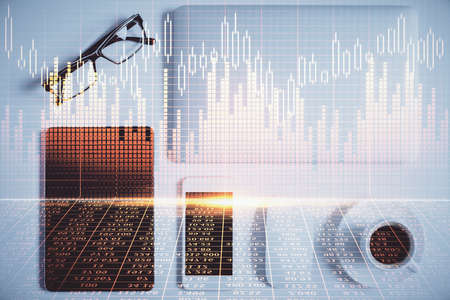 Multi exposure of financial chart hologram over desktop with phone. Top view. Mobile trade platform...