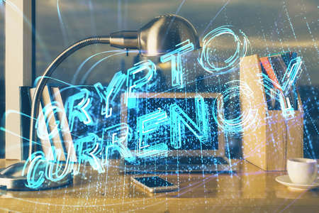 Double exposure of blockchain theme hologram and table with computer background. Concept of bitcoin crypto currency.の写真素材
