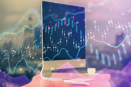 Double exposure of forex chart and work space with computer. Concept of international online...