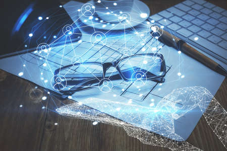 Social network theme drawing with glasses on the table background. Concept of people media connection. Double exposure.の写真素材