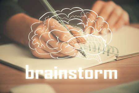 Start up creative drawing over close up hands on background. Concept of brainstorming. Multi...
