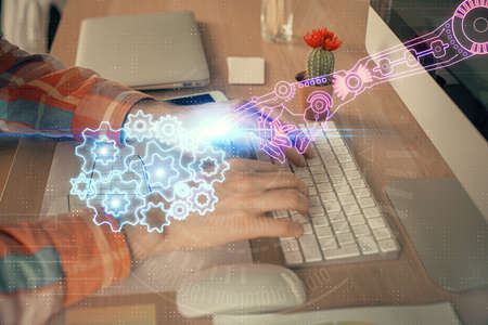 Businessman with computer background with technology theme hologram. Concept of big data. Double exposure.の写真素材