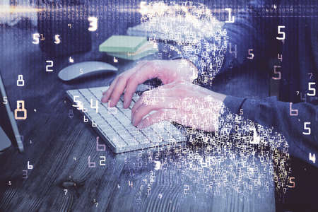 Technology theme hologram with man working on computer on background. High tech concept. Multi...