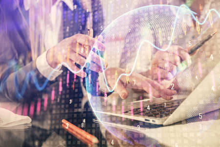 Double exposure of man and woman working together and forex chart hologram. Business concept....