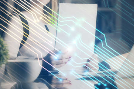 Multi exposure of womans writing hand on background with data technology hud. Big data concept.の写真素材