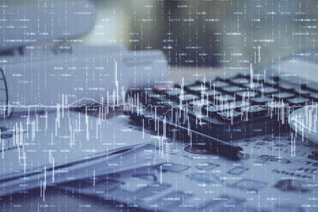 Double exposure of financial chart drawings and desk with open notebook background. Concept of forex marketの写真素材