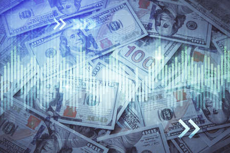 Double exposure of forex graph drawing over us dollars bill background. Concept of financial markets.の写真素材