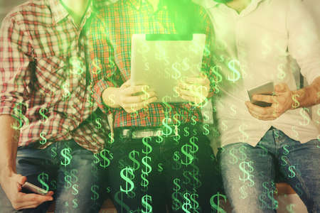 Double exposure of forex graph drawing and man and woman working together holding and using a mobile...