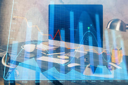 Financial graph colorful drawing and table with computer on background. Double exposure. Concept of...
