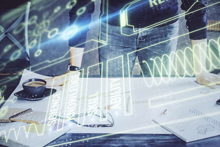 Mans hands working with notes background. Modern computer record diagram with virtual mnitor....