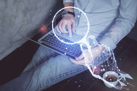 Start up drawings with businessman working on computer on background. Teamwork concept. Double...