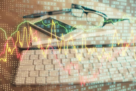 Double exposure of forex chart drawing and cell phone background. Concept of financial trading