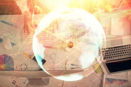 Double exposure of man and woman working together and business theme hologram drawing. Computer...