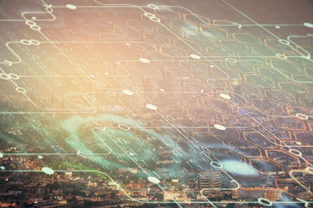 Data theme hologram drawing on city view with skyscrapers background double exposure. Ai concept.の写真素材