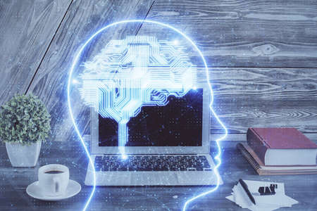 Multi exposure of work space with computer and human brain hologram. Brainstorm concept.