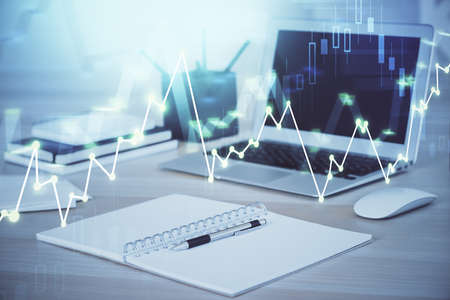 Forex Chart hologram on table with computer background. Double exposure. Concept of financial...