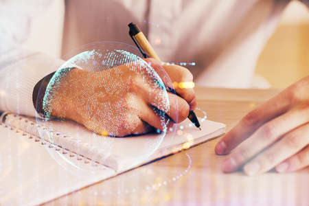 Mans hands with international data network theme double exposure icon. Concept of globalization.の写真素材
