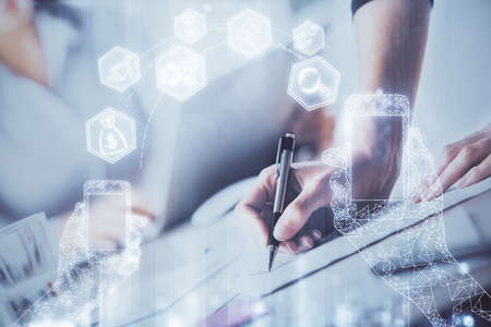 Technology theme hologram over womans hands taking notes background. Concept of Tech. Double...
