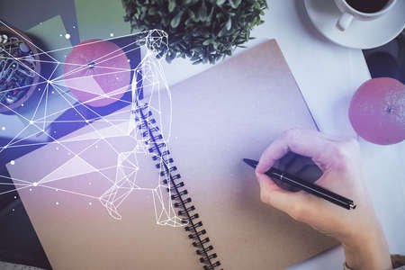 Start up creative drawing over close up hands in notepad background. Concept of brainstorming. Double exposureの写真素材