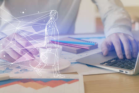 Start up drawings with businessman working on computer on background. Teamwork concept. Double exposure.の写真素材