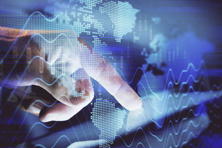 Multi exposure of mans hands holding and using a phone and financial chart drawing. Market analysis...