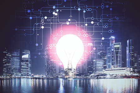 Multi exposure of bulb hologram drawing and cityscape background. Concept of idea.
