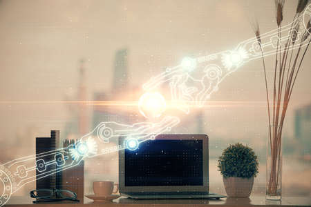 Double exposure of table with computer on background and data theme hologram. Data technology...