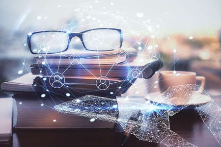 Social network theme drawing with glasses on the table background. Concept of people media connection. Double exposure.の写真素材
