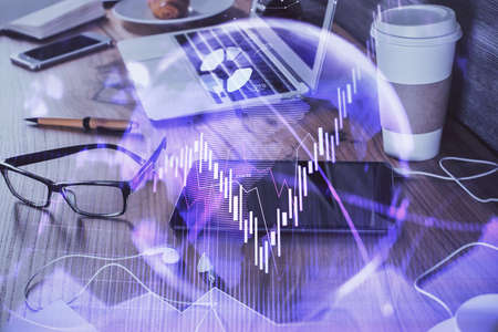 Double exposure of forex chart drawing and cell phone background. Concept of financial trading