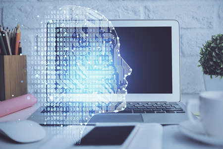 Double exposure of work space with computer and human brain drawing hologram. Brainstorm concept.