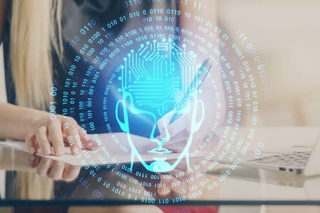 Multi exposure of womans writing hand on background with brain hud. Concept of learning.