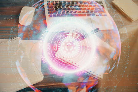 Tech theme hologram over womans hands taking notes background. Concept of hightech. Double exposure