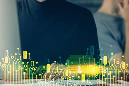 Multi exposure of data internet theme hologram with man working on computer on background. Concept...