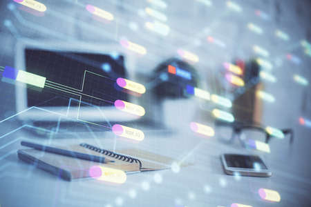 Double exposure of desktop computer and technology theme hologram. Concept of software development.の写真素材