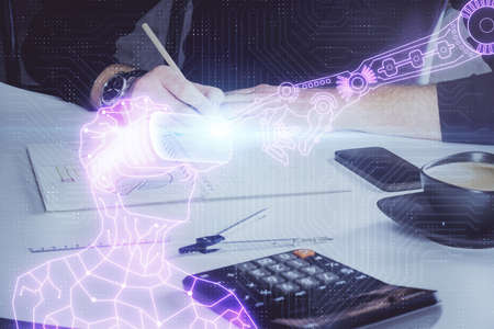 Abstract man wearing augmented reality headsets computer work with writing human background. AR concept. Double exposure.の写真素材