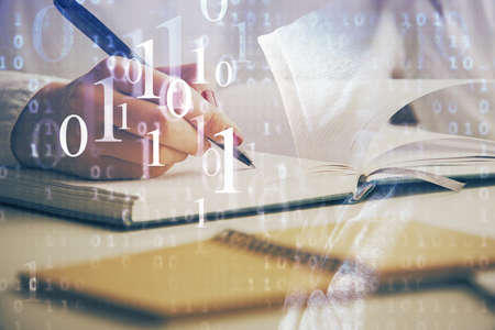 Multi exposure of writing hand on background with data technology hologram. Concept of innovation.