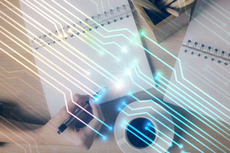 Multi exposure of womans writing hand on background with data technology hud. Concept of innovation.