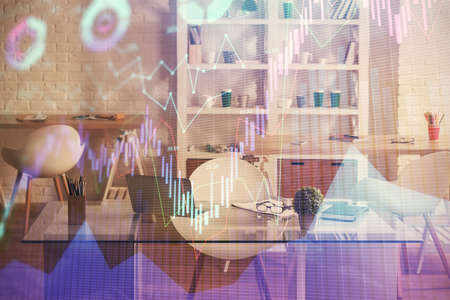 Double exposure of financial graph drawing and office interior background. Concept of stock market.の写真素材