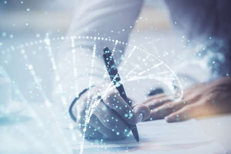 Mans hands working with notes background. Genetic engineering and gene manipulation concept. Multi...
