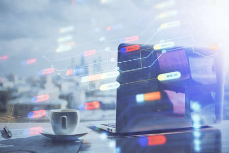 Double exposure of computer and technology theme hologram. Concept of freelance work.