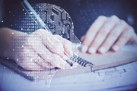 Multi exposure of writing hand on background with brain hologram. Concept of learning.