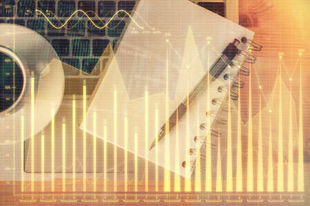 Multi exposure of forex chart drawing and work table top veiw. Concept of financial analysis.