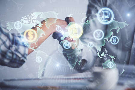Double exposure of forex graph hologram and handshake of two men. Stock market concept.