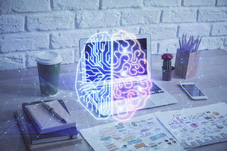 Multi exposure of work space with computer and human brain hologram. Brainstorm concept.